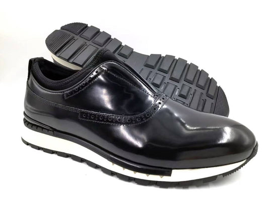 The Hybrid Brogue Runner with its high-shine black leather upper, traditional brogue perforations, black neoprene ankle collar, and a thick black and white high-traction sole.