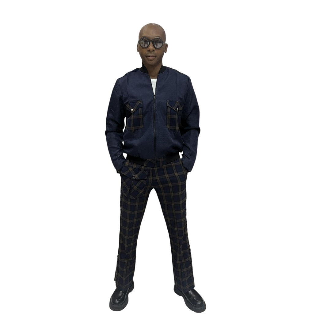 Tracksuit featuring a dark blue zip-up jacket with plaid pocket accents and matching plaid trousers with a side cargo pocket