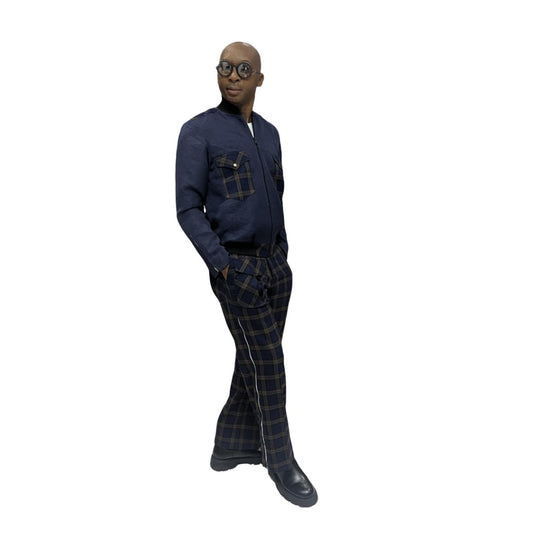 Tracksuit featuring a dark blue zip-up jacket with plaid pocket accents and matching plaid trousers with a side cargo pocket