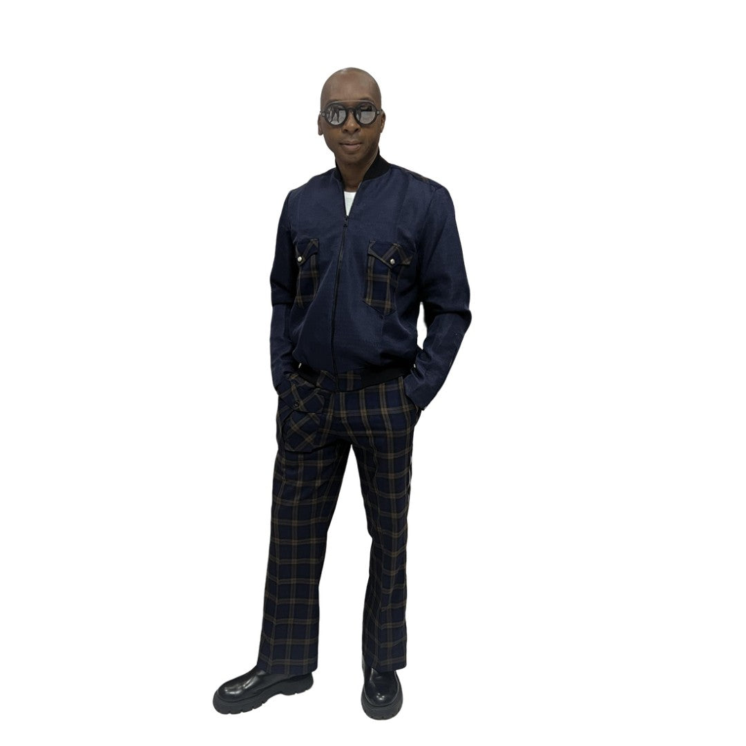 Tracksuit featuring a dark blue zip-up jacket with plaid pocket accents and matching plaid trousers with a side cargo pocket