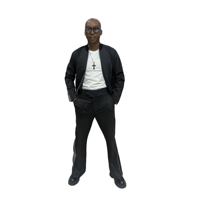 Tracksuit featuring a black bomber-style jacket with patterned sleeve accents and matching transformer pants with side-zip detailing