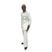 Two-piece matching outfit in white with dark plaid trim on the neckline and sleeves