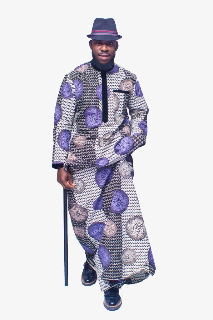 Two-Piece Set featuring a long-sleeved Ankara shirt and a matching traditional wrapper in a purple, silver, and black houndstooth pattern, finished with a black velvet collar and vertical chest placket