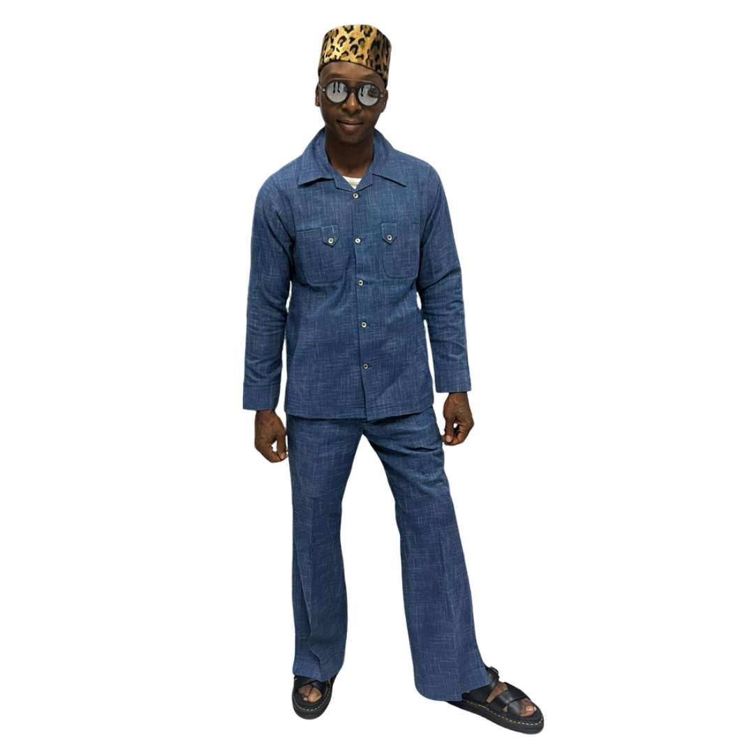 Two-Piece Set featuring a dark blue matching shirt and trousers with a clean neckline and minimalist silhouette.