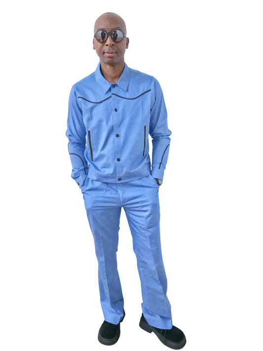 Azure blue two-piece set featuring a long-sleeved cowboy-style jacket with black western piping and matching tailored trousers. -Front View