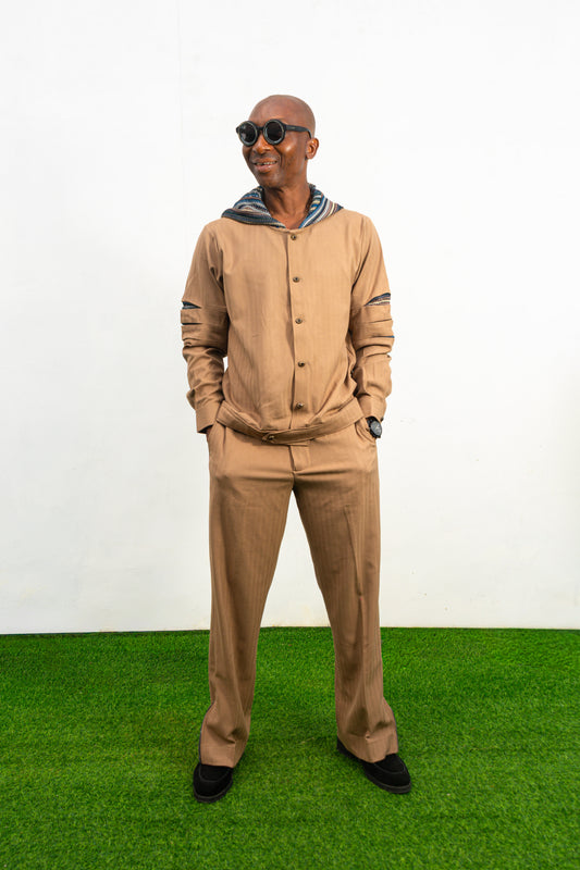 Two-Piece Set featuring a brown long-sleeved hooded shirt with blue patterned sleeve accents and matching straight-leg trousers.