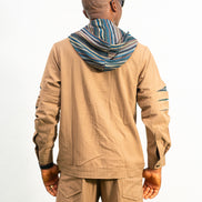 Two-Piece Set featuring a brown long-sleeved hooded shirt with blue patterned sleeve accents and matching straight-leg trousers.