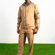Two-Piece Set featuring a brown long-sleeved hooded shirt with blue patterned sleeve accents and matching straight-leg trousers.