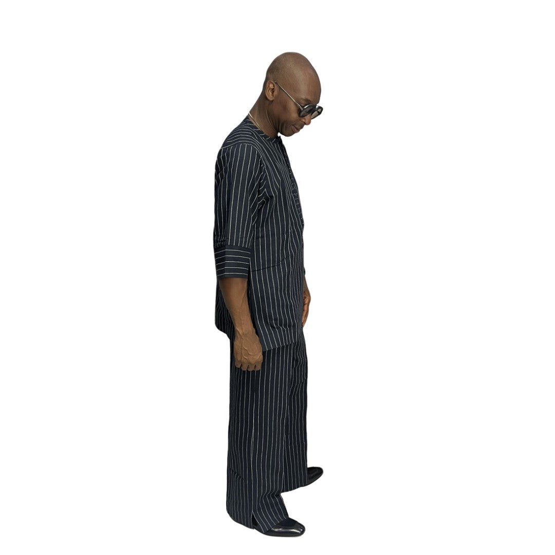 Two-Piece Set featuring a deep blue, white-striped short-sleeved tunic shirt with structured cuffs paired with matching wide-leg pinstripe trousers
