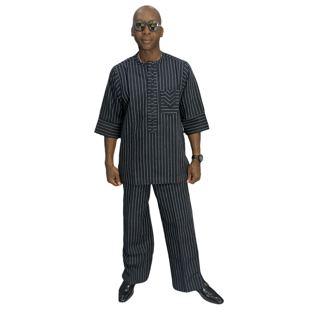 Two-Piece Set featuring a deep blue, white-striped short-sleeved tunic shirt with structured cuffs paired with matching wide-leg pinstripe trousers