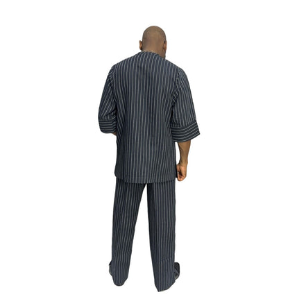 Two-Piece Set featuring a deep blue, white-striped short-sleeved tunic shirt with structured cuffs paired with matching wide-leg pinstripe trousers