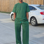 Forest emerald two-piece set featuring a boxy short-sleeved crewneck top and matching wide-leg trousers. - Men's Casual Wear