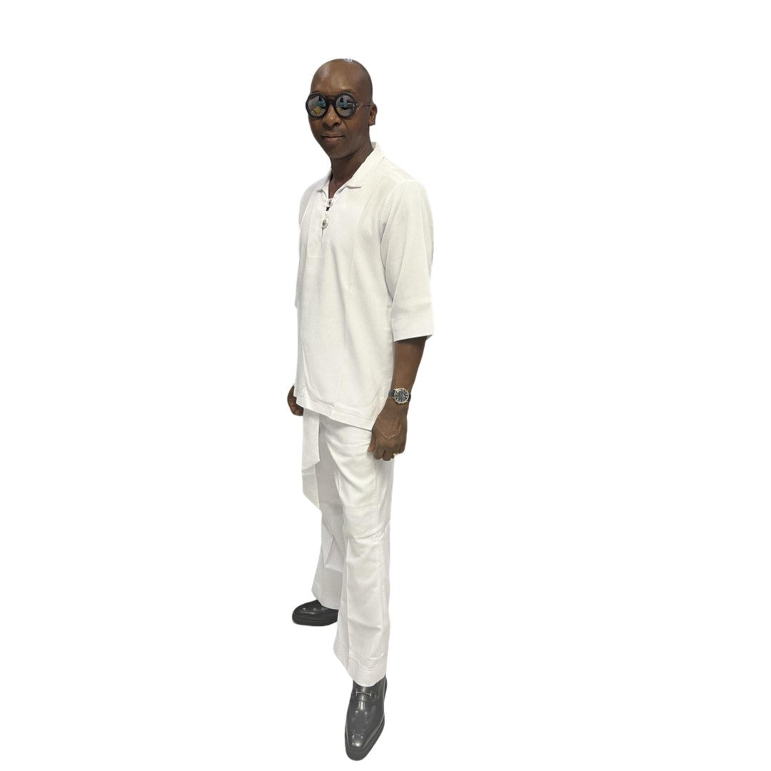 Two-Piece Set featuring a crisp white short-sleeved tunic top with a structured collar, metallic button detailing, and matching wide-leg trousers accented by an integrated fabric belt tie