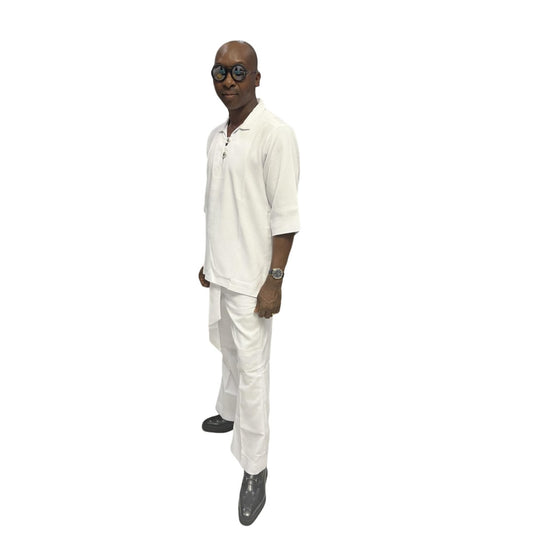 Two-Piece Set featuring a crisp white short-sleeved tunic top with a structured collar, metallic button detailing, and matching wide-leg trousers accented by an integrated fabric belt tie
