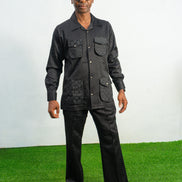 Two-Piece Set featuring a black textured viscose safari-style button-down shirt with four utility pockets and matching boot-cut trousers.