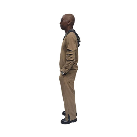 Two-Piece Set featuring a tan button-down shirt with a multicolored striped hoodie and arm cut-outs, paired with matching straight-leg trousers
