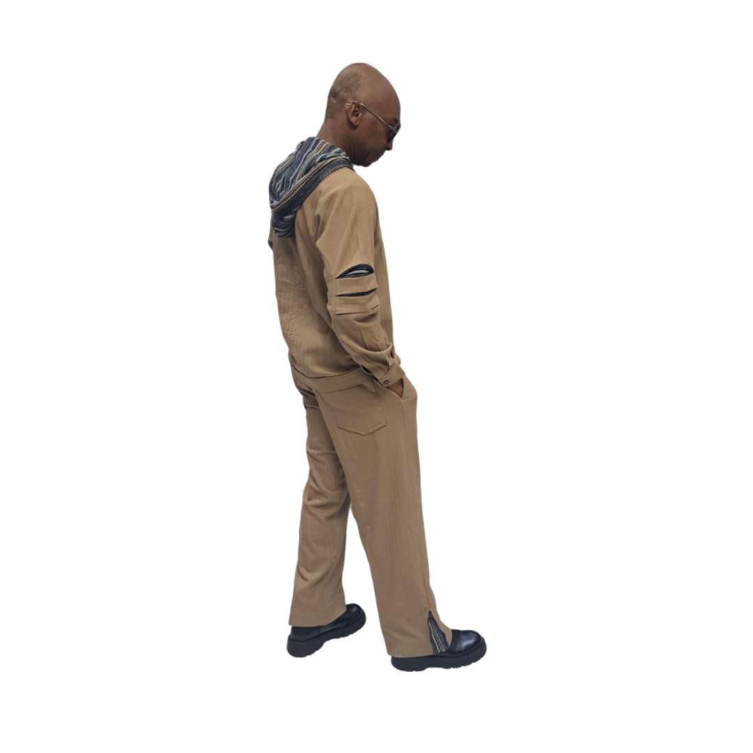 Two-Piece Set featuring a tan button-down shirt with a multicolored striped hoodie and arm cut-outs, paired with matching straight-leg trousers