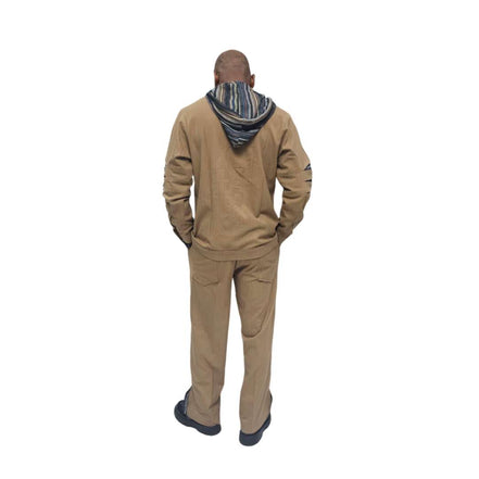 Two-Piece Set featuring a tan button-down shirt with a multicolored striped hoodie and arm cut-outs, paired with matching straight-leg trousers