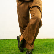 Two-Piece Set featuring a brown short-sleeved top and matching trousers in a textured weave with a simple crew neckline and relaxed silhouette. Bottoms View