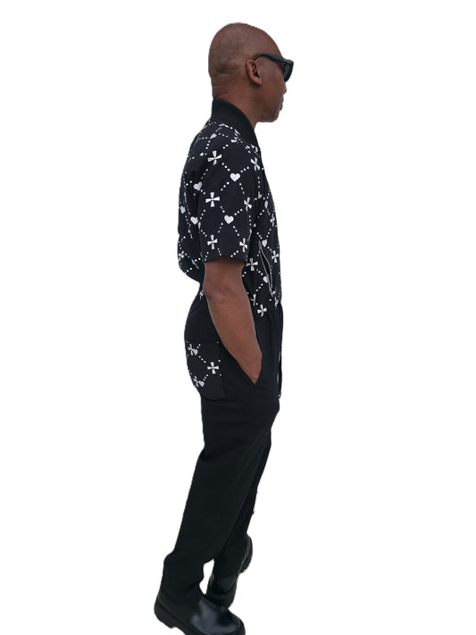 Urban Heritage short-sleeve utility jumpsuit featuring a black and white geometric - Side View