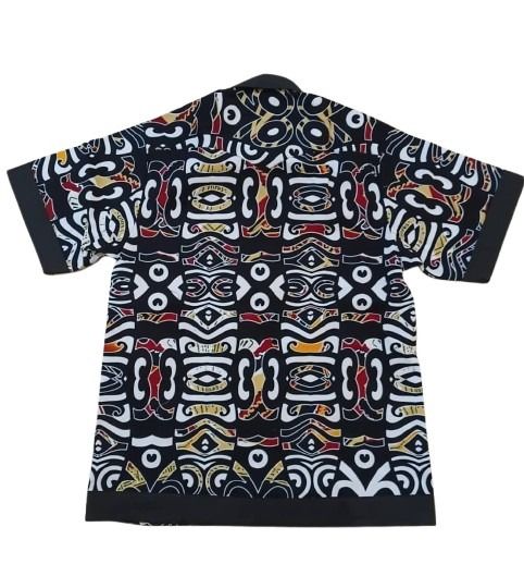 Short-sleeve shirt with a colorful geometric pattern on a white background