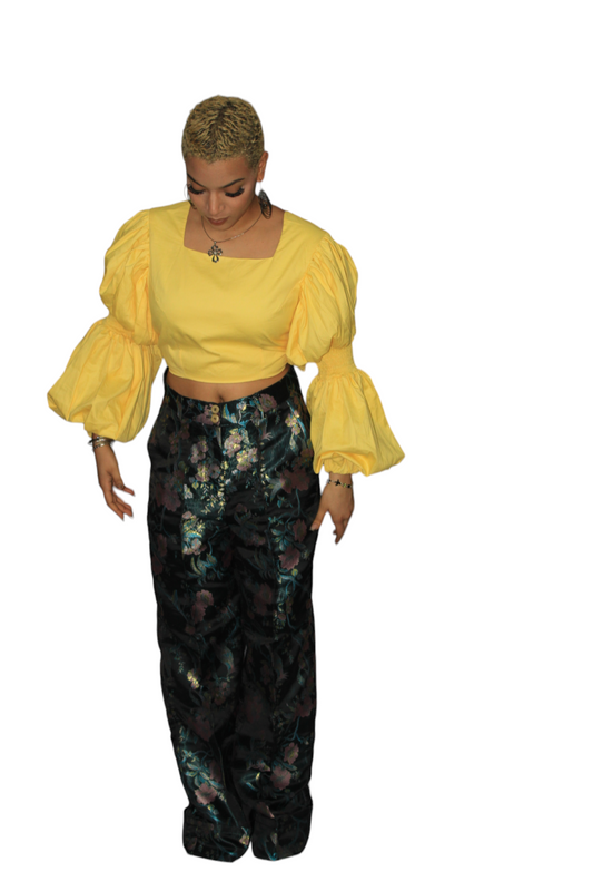 African Women's Pants featuring high-waisted, wide-leg trousers crafted from a dark, metallic floral jacquard damask fabric