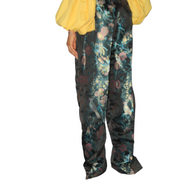 African Women's Pants featuring high-waisted, wide-leg trousers crafted from a dark, metallic floral jacquard damask fabric