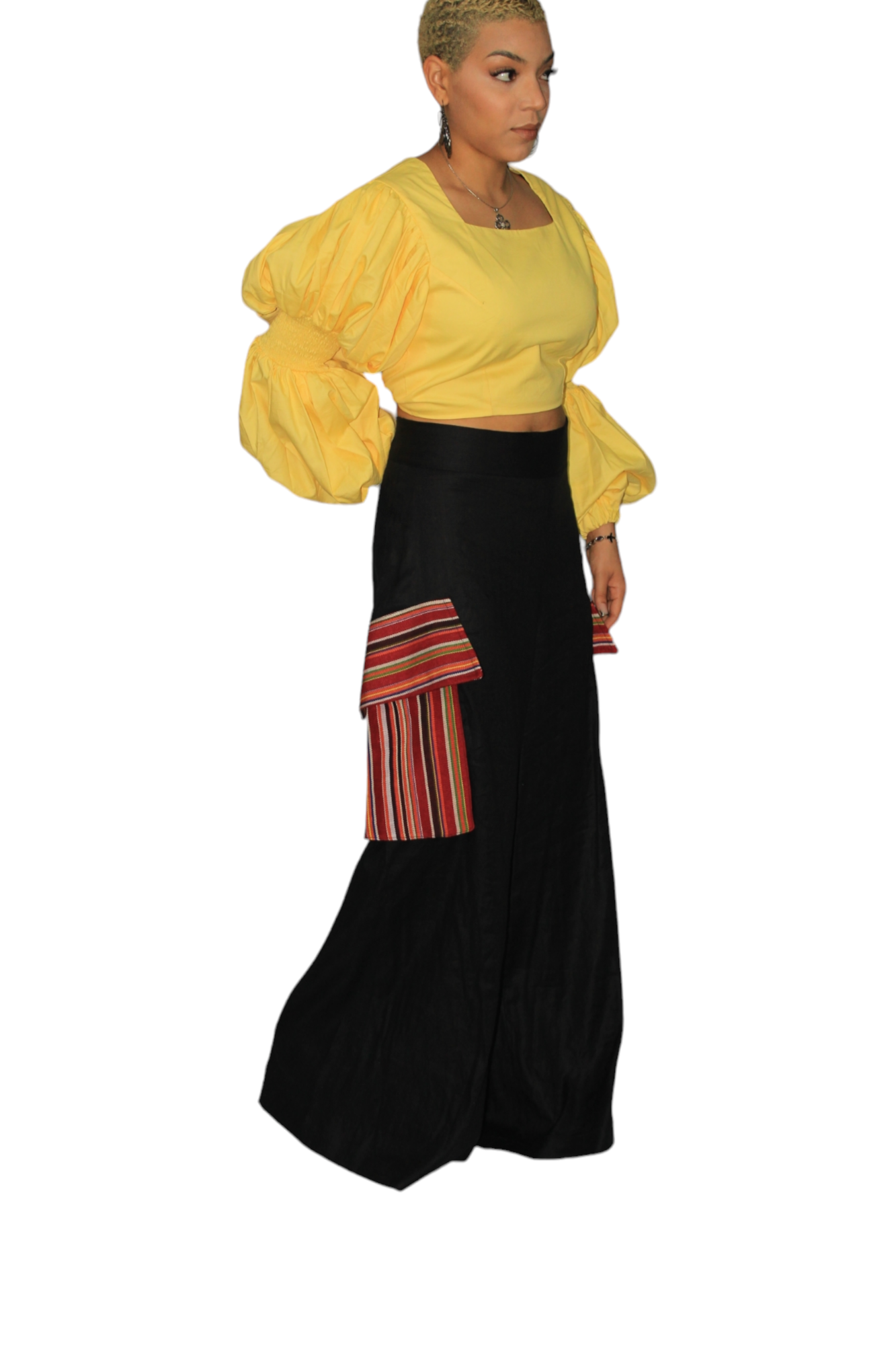 African Women's Pants featuring a high-waisted black wide-leg silhouette with distinct multi-colored striped Aso Oke side patch pockets