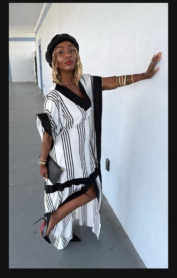 Customer posigin in  a Wandizi Kaftan