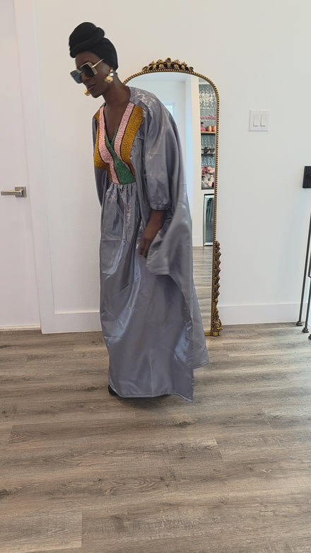 Luxury silver-grey Beaded Boubou Kaftan featuring a V-neckline with a colorful beaded mosaic pattern and voluminous sleeves.