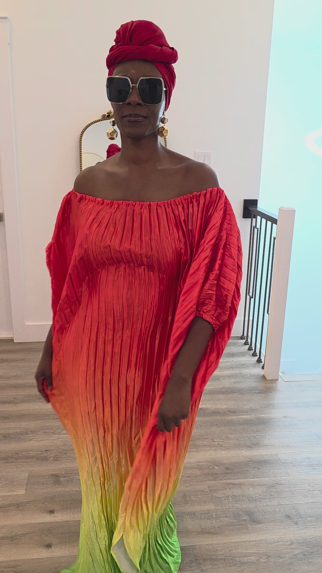 Pleated Ombre Kaftan available in red-green, yellow-pink, and pink-blue gradients, featuring a wide neckline and a flowing Boubou silhouette.Video
